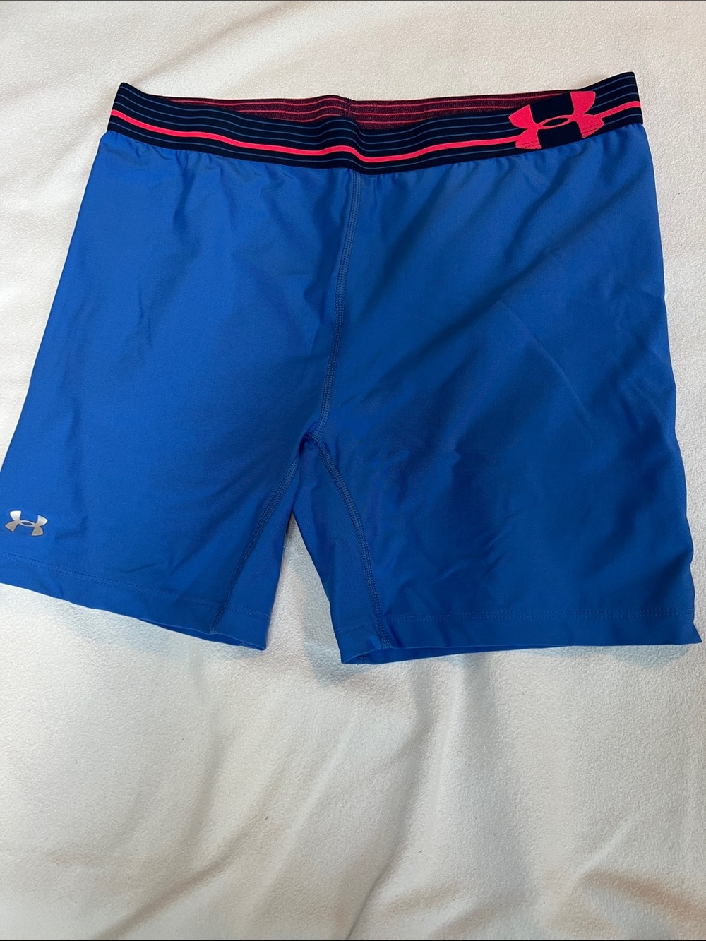 Under Armour Women's Blue Athletic Shorts with Pink Accent Waistband